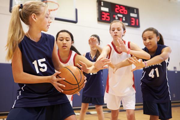 Girls playing basketball