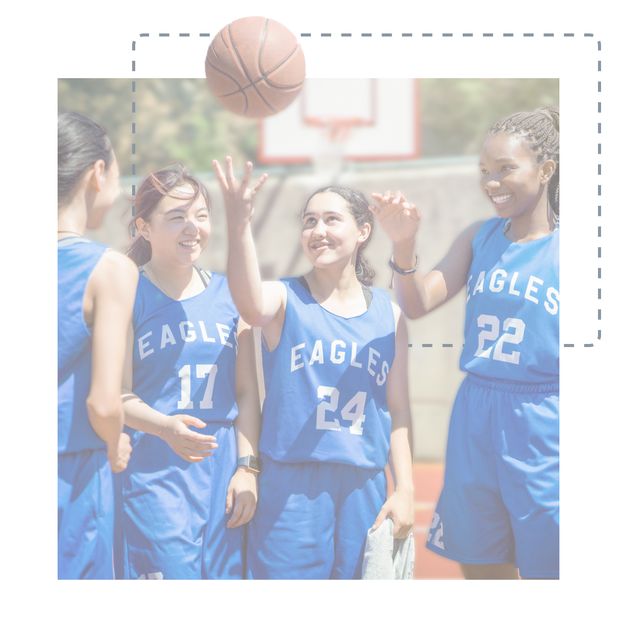 Youth basketball players warming up for a game